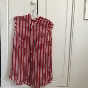 Equipment red and white sheer sleeveless top.